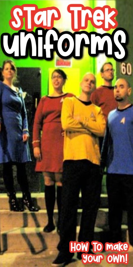 men and women standing in Star Trek costumes