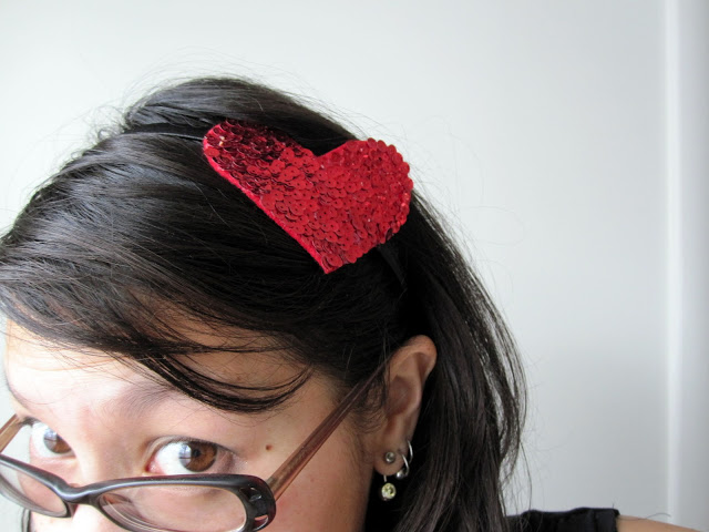 woman wearing heart headband