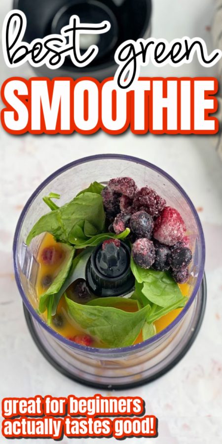 view of blender with green smoothie ingredients