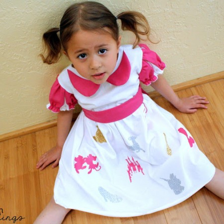 girl in pink and white cinderella dress