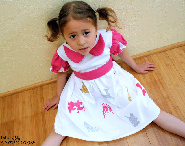 girl in pink and white cinderella dress
