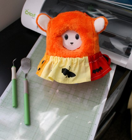 Use the Cricut to make a cute bug skirt for the Ubooly interactive toy - Rae Gun Ramblings