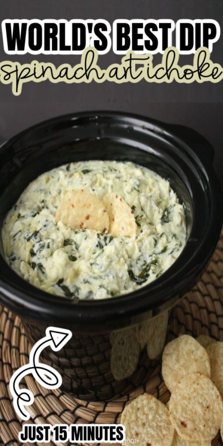 crock pot full of spinach artichoke dip and chips
