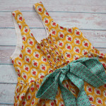 how to easily add an elastic back panel to a dress. great sewing tutorial perfect for kids clothing, maternity wear, or anyone who likes flexible fits and comfort in their clothing.