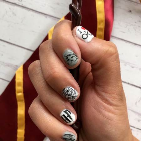 Awesome nail stamping tutorial for darling Harry Potter manicure