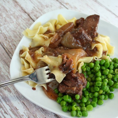 New family favorite recipe. Super easy crock pot beef onion pasta recipe with double duty leftover recipes