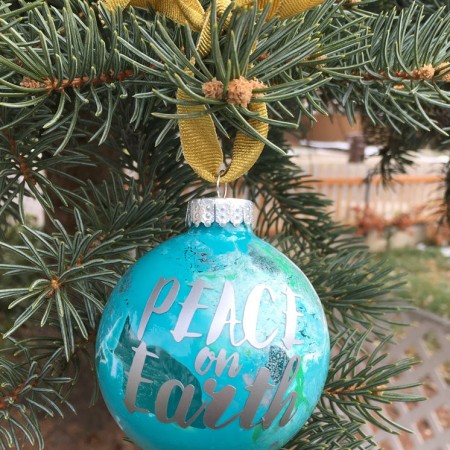 Make a glass ornament that looks like a globe with easy marbled painting. Peace on Earth ornament tutorial.