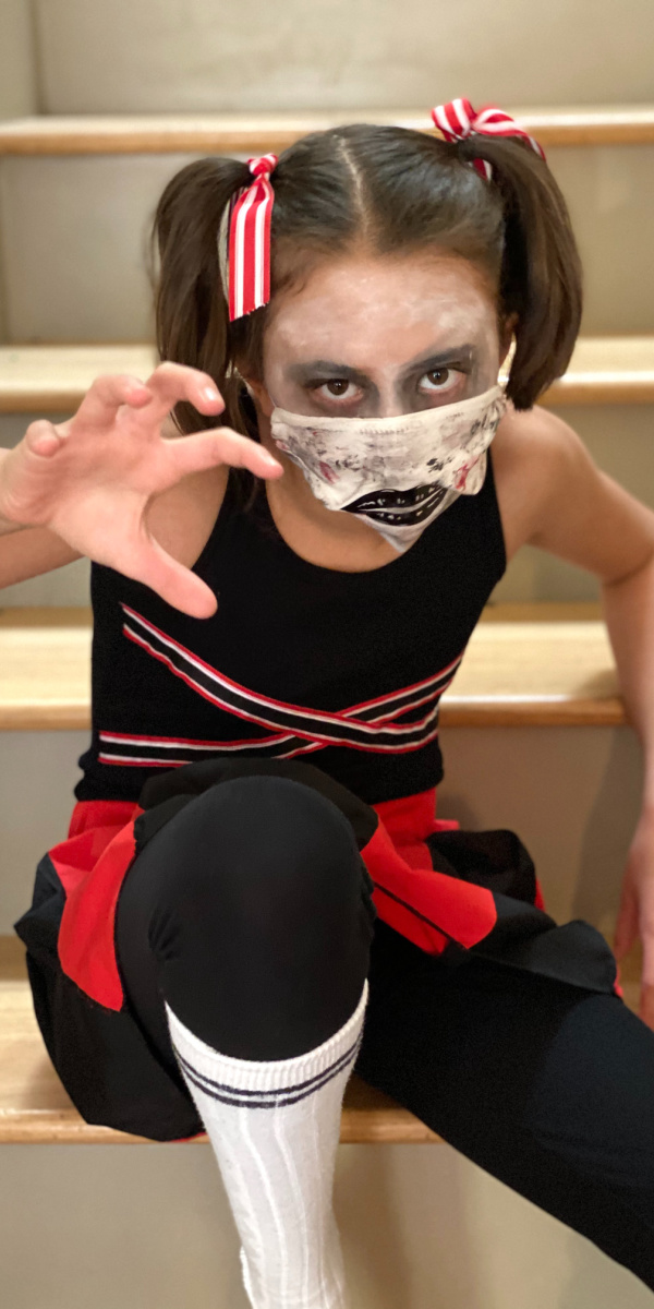girl in zombie cheerleader costume