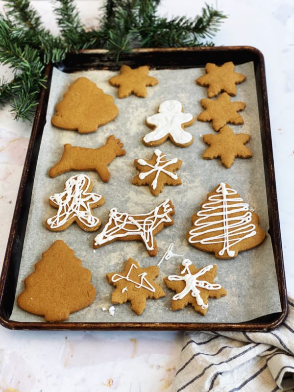 Tray of Christmas gingerbread cookies iced and uniced