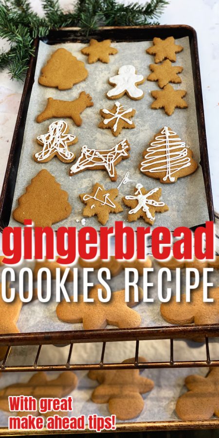 plate of christmas gingerbread cookies and trays baking