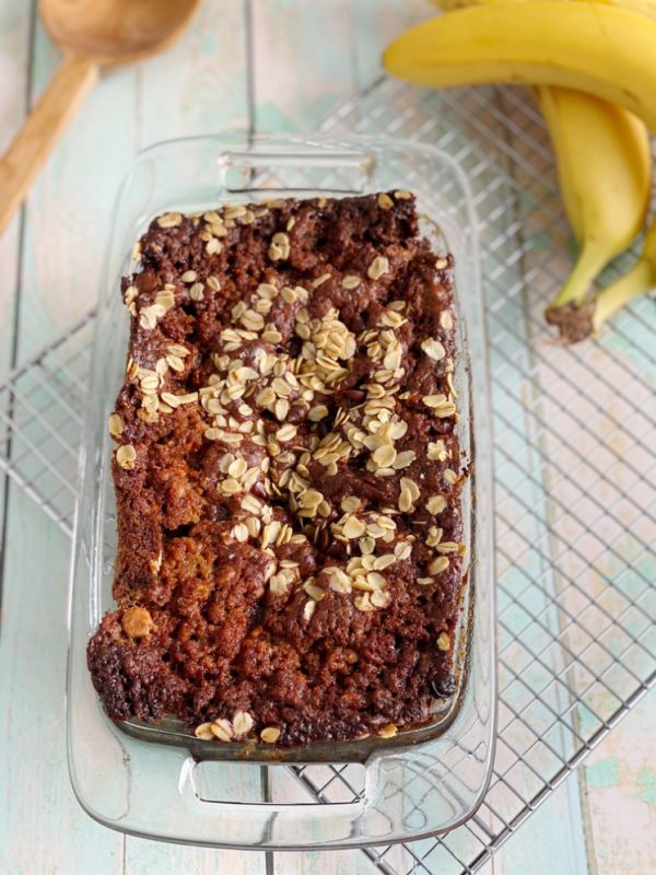 loaf of banana oatmeal bread on calling rack