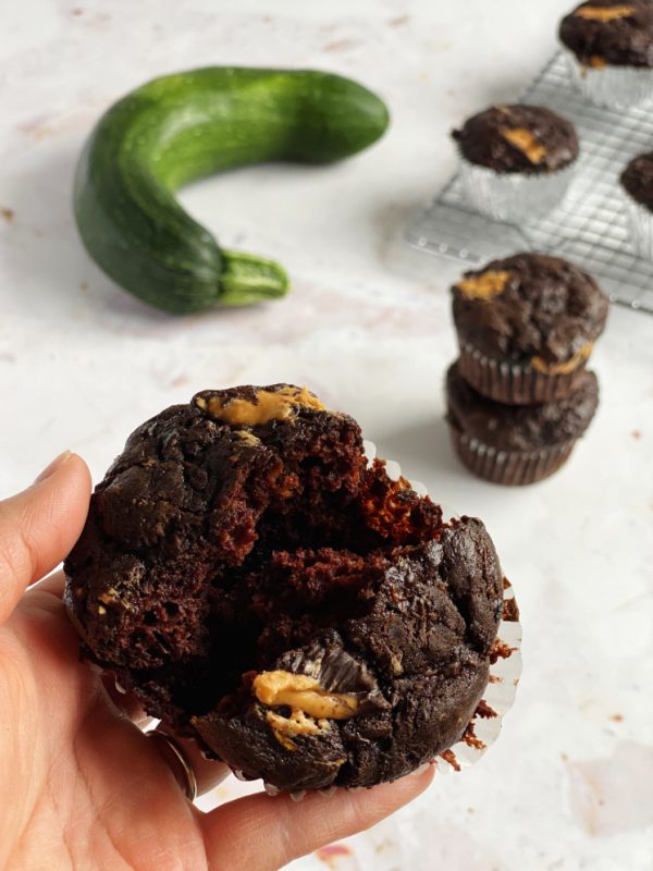 chocolate zucchini muffin in half