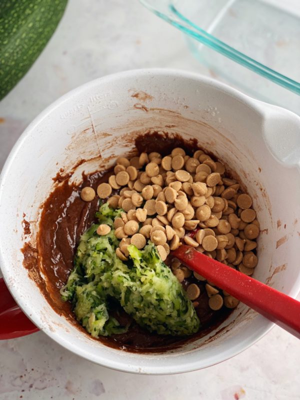 bowl of ingredients for chocolate zucchini bread with peanut butter