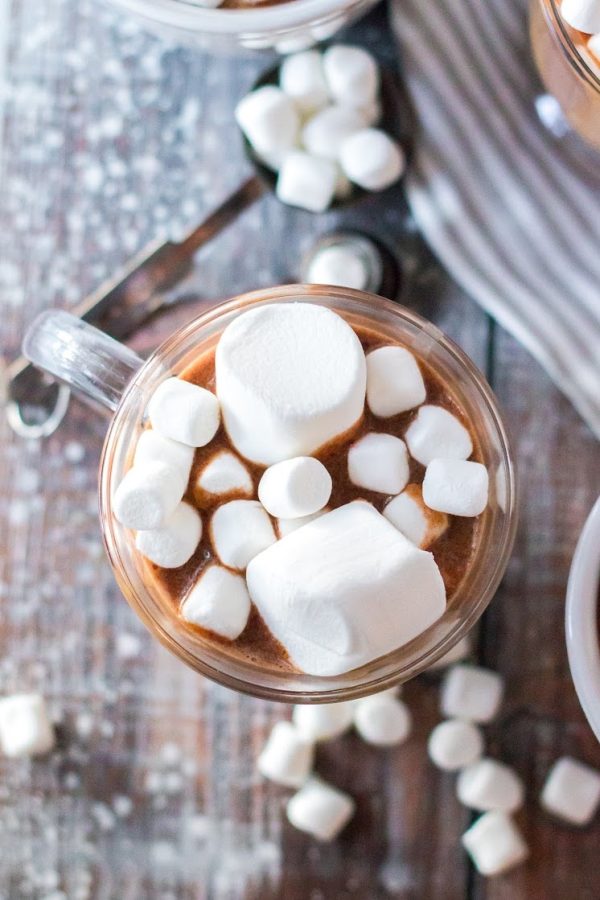 Overhead view of mug of peanut butter hot chocolate with lots of marshmallows