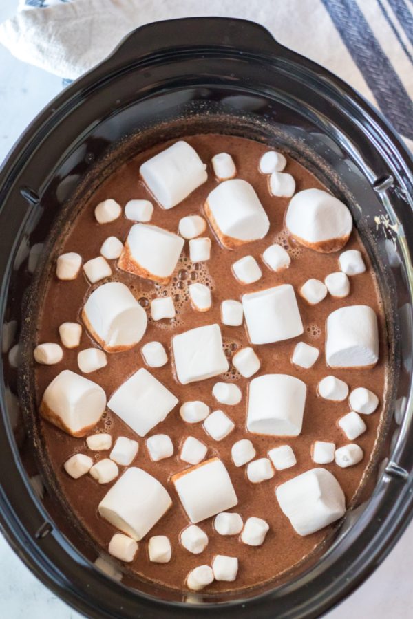 Slow cooker with crock pot hot chocolate and marshmallows