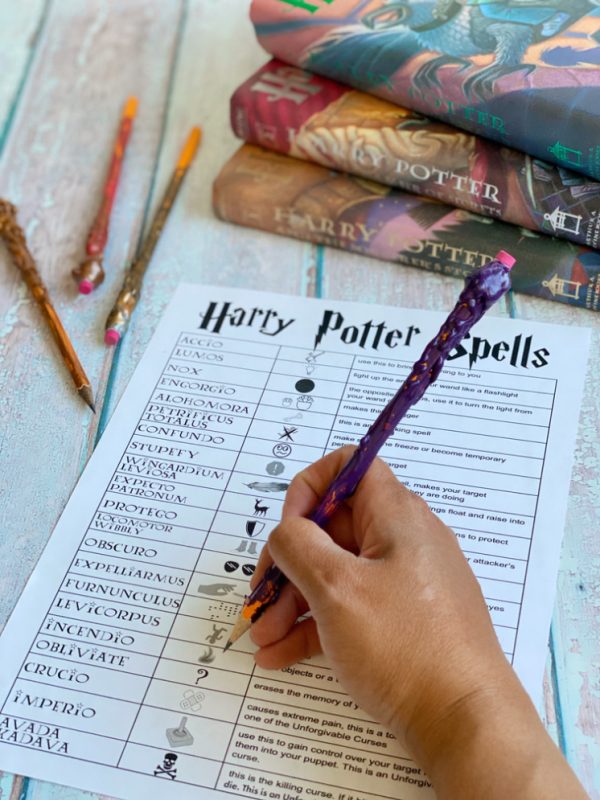 hand writing on Harry Potter spell list wand pencils