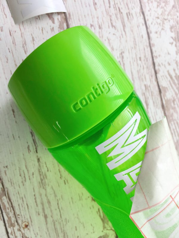 peeling transfer tape and vinyl labeled water bottle