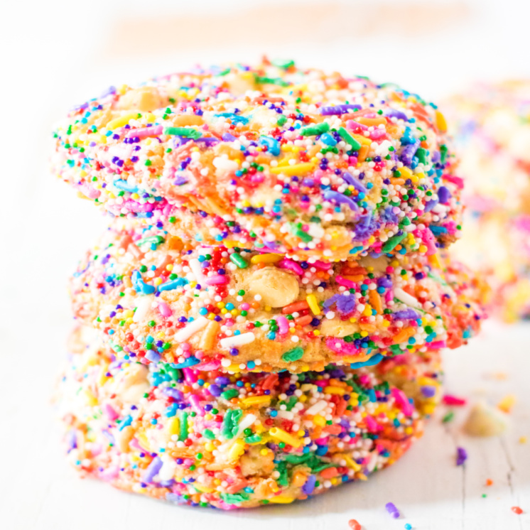 funfetti cookies stacked in rainbow sprinkle cookie pile