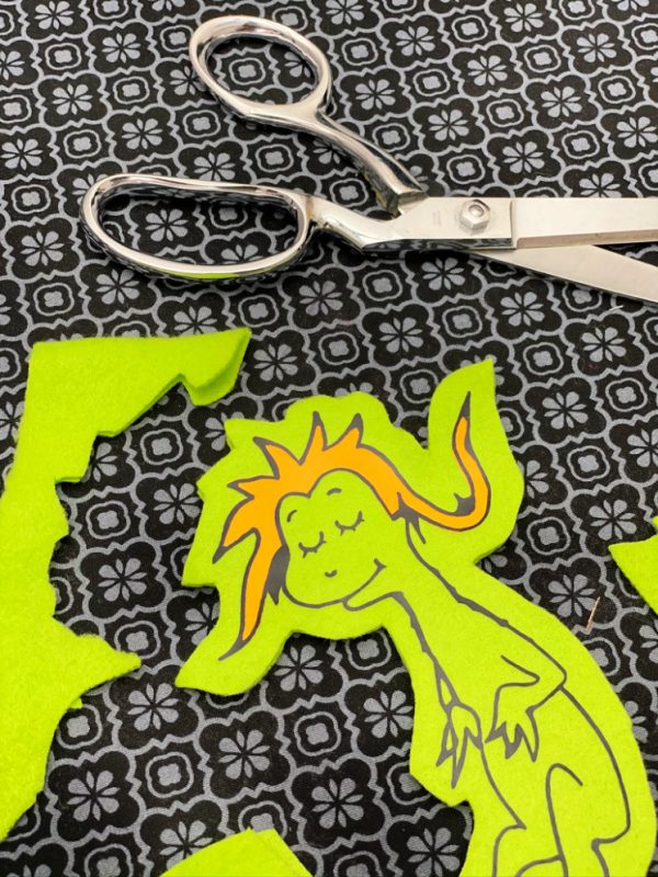 Image of wocket in my pocket from dr. seuss cut out of fabric